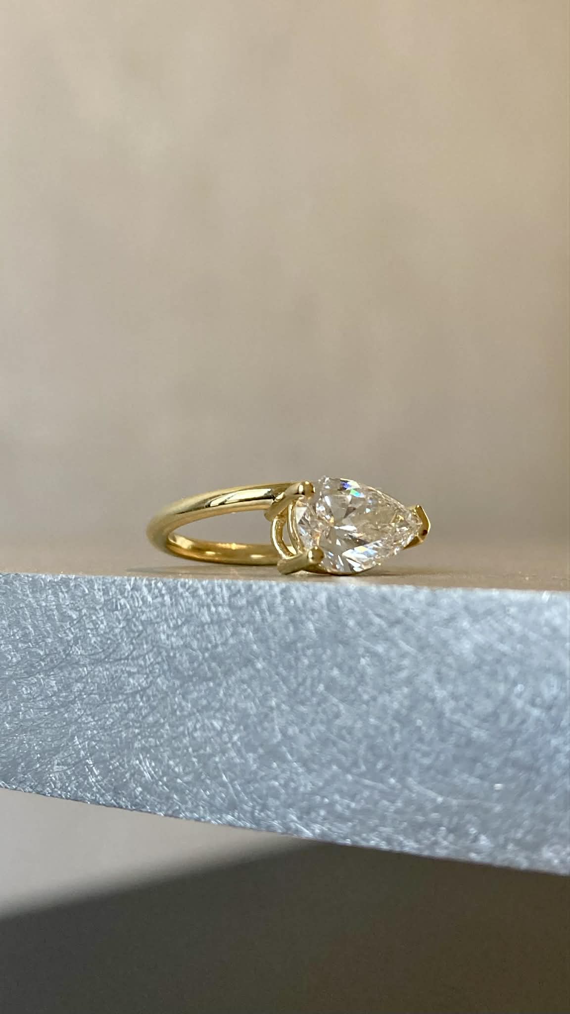 1.50ct PEAR DIAMOND RING on the side
